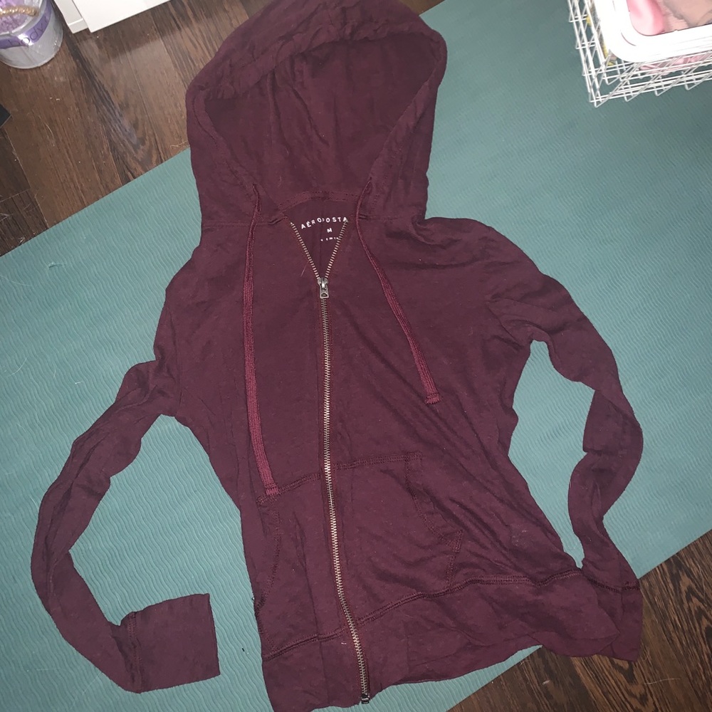 maroon zip up jacket